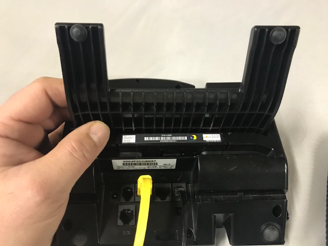 Slide the stand into the back of the phone