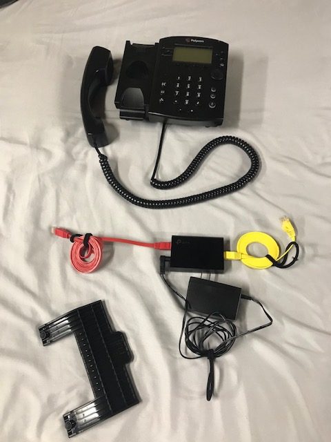 Disassembled: Phone, PoE injector and stand
